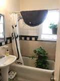 Our apartment homes feature modern white kitchen and bath cabine