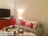 beautiful furnidshed top floor viewng beach