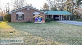 32 home plus a Shed and Swing Set Sits on Close to 12 an acre in