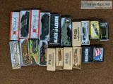 A variety of different kinds of pocket knives