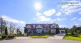 Extraordinary living on 5 acres of private woodland
