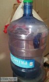 Two 5 gallon Primo refillable water bottles