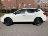 2009 Nissan Rogue. All-wheel drive.