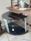 Half-round table with glass shelf