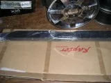 a pair of raptor nerf bars for a nissan