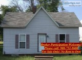 Handyman Special Single Family sitting on a Corner Double Lot