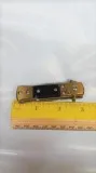 baby button operated pocket knife black