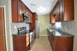 Let The Cherry Cabinets Bring Warmth To Your Kitchen