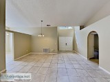 The interior features stylish tile flooring for a low-maintenanc