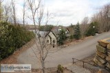 Prestigious and unique house along Pontbriand lake in Rawdon