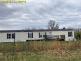 1 Acre Lot Occupied by a Mobile Home 16900