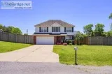 Must See Beautiful home on a large corner lot over .6 acre.