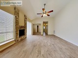 Featuring beautiful curb appeal and landscaping