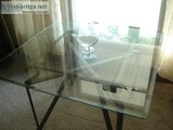 TABLE with beautiful glass top w beveled edges. excellent condit
