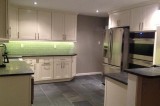 Timeless Mystic White Kitchen Cabinets for an Elegant Nook