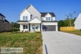 Check out this Amazing custom-built home on a large lot