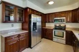 Rich Brown Cafe Vienna Kitchen Cabinets for Modern Homes
