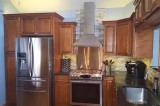 Turn Heads at House Party by Getting Toffee Cabinets