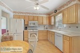 Kitchen Cabinets In Bleached Oak With  Corian Counter Top