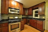 Switch to a vibrant kitchen with glazed maple cabinets