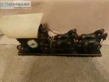 Vintage RARE Bronze Covered Wagon Lighted Electric Mantel Clock