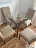 Dining Table and Four Tan Chairs