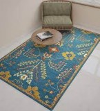Attractive hand-woven carpet on pepperfry
