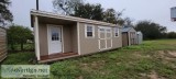Cabin with a corner porch storage building 12x28