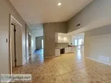 Cozy bedrooms a stone fireplace and a kitchen equipped with a br