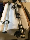 Two Thule roof mount bike racks
