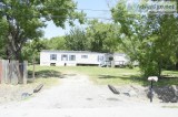 3 bedroom 2 bath in one acre of land.