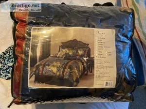 New never opened dragon bedding set