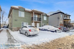 Magnifique triplex à Bois-des-Filion Possibilité con