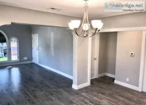 Spacious Kitchen with tall cabinetry and quartz countertops