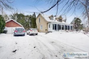 Maison &agrave L &Icircle-Bizard avec acc&egraves au lac des Deu