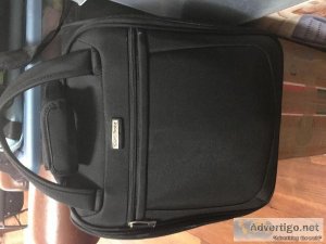 Moving Sale Samsonite black carry on under seater in great condi