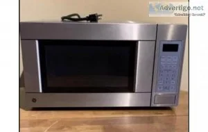 Moving Sale Pre owned GE MWave oven 1100 Watts JES1142