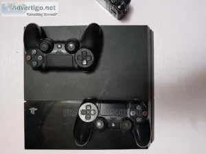 NEATLY USED PS4 WITH TWO WORKING GAME PADS