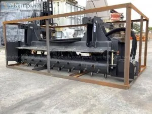 UNUSED LANDHONOR POWER RAKE ATTACHMENT FOR UNIVERSAL SKID STEER