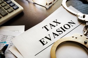 What is tax evasion | tax evasion meaning