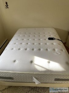 Full sized Sealy posturpedic mattress and adjustable frame