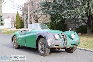 24090 1954 Jaguar XK120 Roadster with C-Type