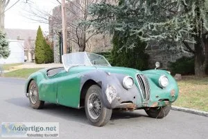 24090 1954 Jaguar XK120 Roadster with C-Type