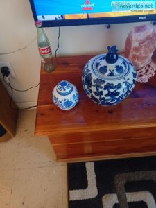 Small and large pottery jars with lids