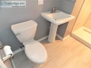 White Pedestal Sink And White Toilet
