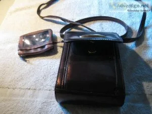 Small purse ( 5&rdquo X 8&rdquo) with shoulder strap and a non-d