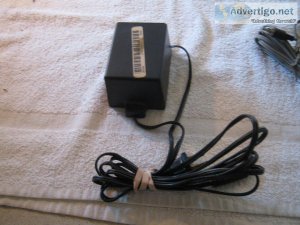 In-line power supply.  Input 120VAC. Output 30 VDC 400 mA.  Roun