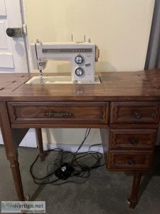 1970s sewing machine with cabinet