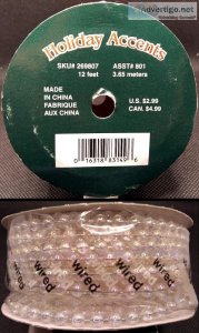 Three unused spools of Holiday Accents Clear Beads (12 feet each
