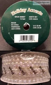 Three unused spools of Holiday Accents Clear Beads (12 feet each